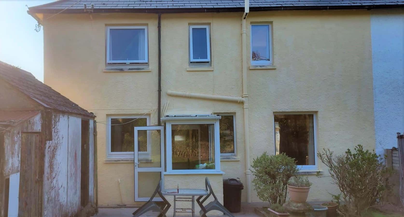 The rear of house, looking brighter with a new wall coating